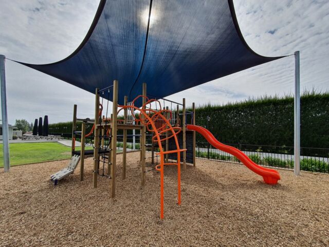 Navy blue and bright orange makes this cute new playground at Village Baptist Church in Havelock North a beautiful addition to the church.

#expertsatplay #playstartshere #play #Churchplayground #playunit #shadesail #slide #playspace